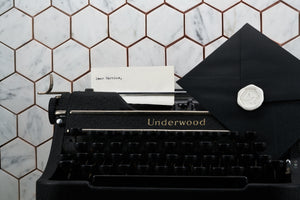 Image of the Dear Martian holiday gift option which features a typed letter on a vintage underwood typwriter.