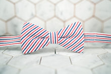 A beautifully handmade patriotic seersucker bow tie by Dear Martian. 
