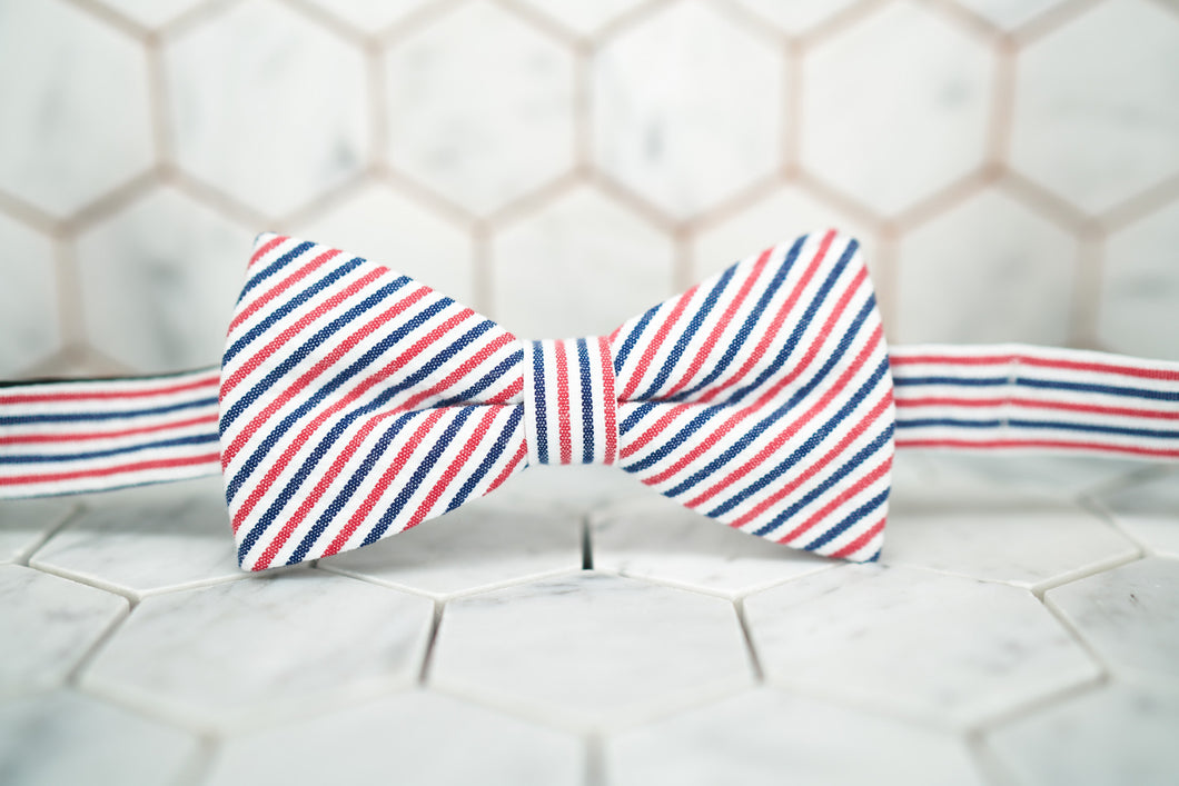 A beautifully handmade patriotic seersucker bow tie by Dear Martian. 