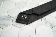 The back of the Strauss Raw denim black skinny tie made by Dear Martian.