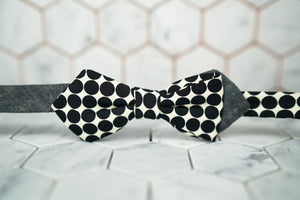 An image of a funky polka dot patterned bow-tie by Dear Martian, Brooklyn.