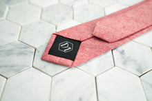 The back of Dear Martian's chambray red skinny tie, featuring our DM logo tipping.