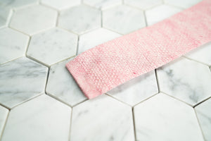 A more detailed shot of the Dear Martian, Marilyn Monroe pink linen necktie.