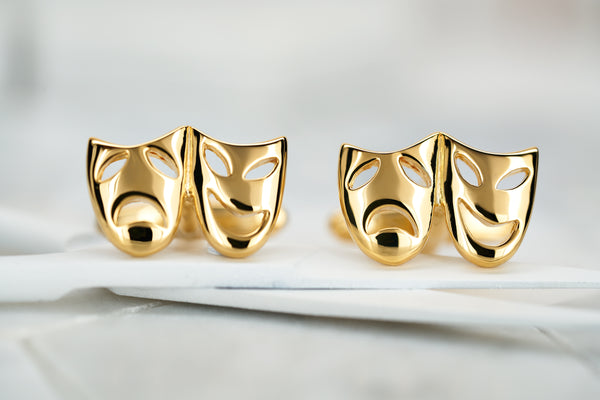 An image of Dear Martian gold plated theater mask cufflinks.