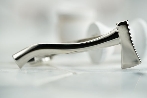 A front image of the Kloven Dear Martian steel plated axe tie bar.
