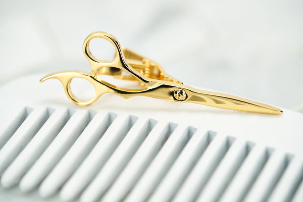 An image of the gold plated fleet street scissor tie clip.