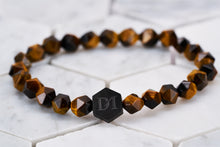 An image of the Bengal Tiger Eye chakra stone bracelet by Dear Martian.