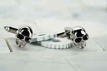 A front image of the Vie handmade silver skull cufflinks from Dear Martian accessories. 