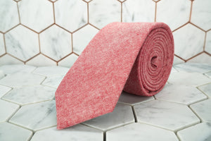 An image of the Haskins Townsend coral red necktie made by Dear Martian.