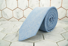 An product image of the Dear Martian Haskins Townsend, blue chambray skinny tie.