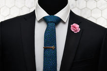 The Dear Martian, Brooklyn Ditsy floral neck tie is paired up and displayed on a mannequin with our Connors gold fleur de list tie clip and pink gingham flower lapel pin.