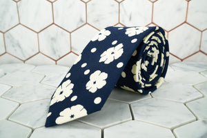 An image of the navy floral, polka-dotted necktie by Dear Martian, Brooklyn.