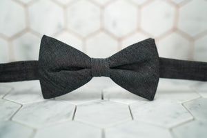A front view image of the DM raw denim black bow tie.